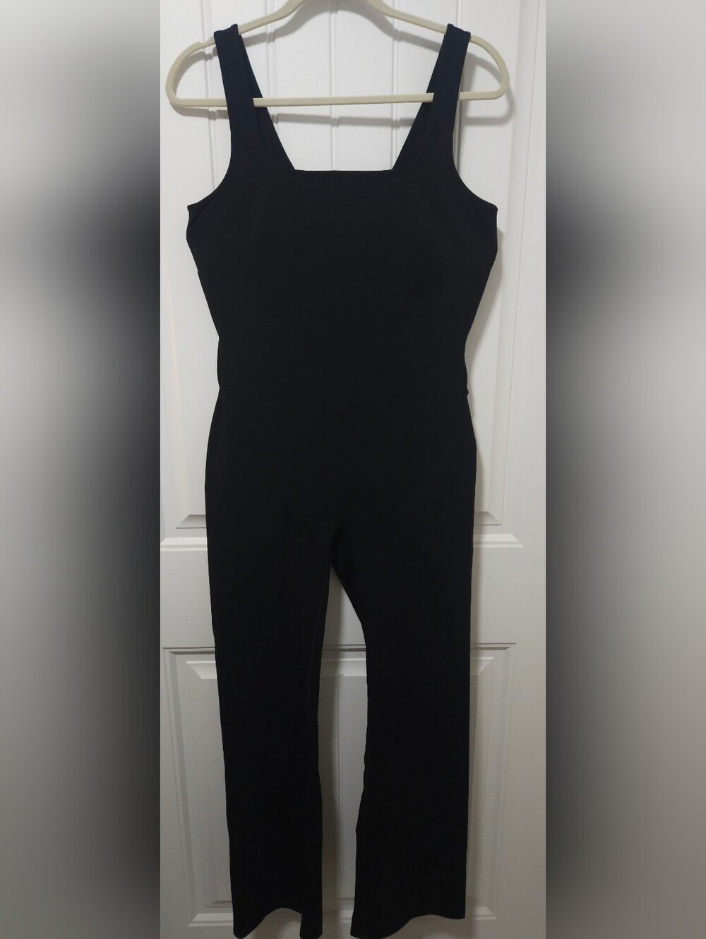 SPANX Booty Boost flare leg bodysuit with easy-access back